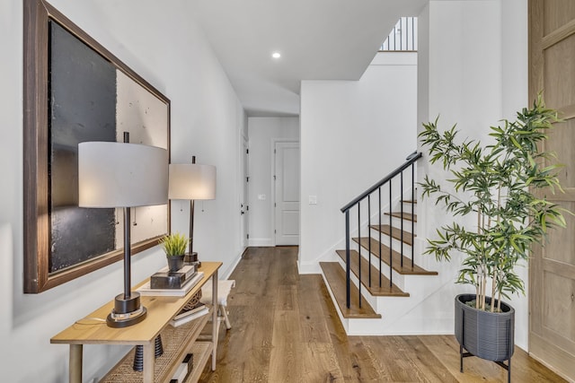 foyer with wood-type flooring