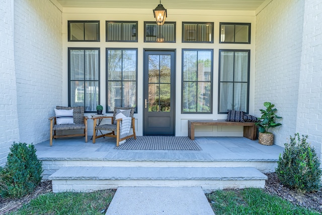 doorway to property with a porch