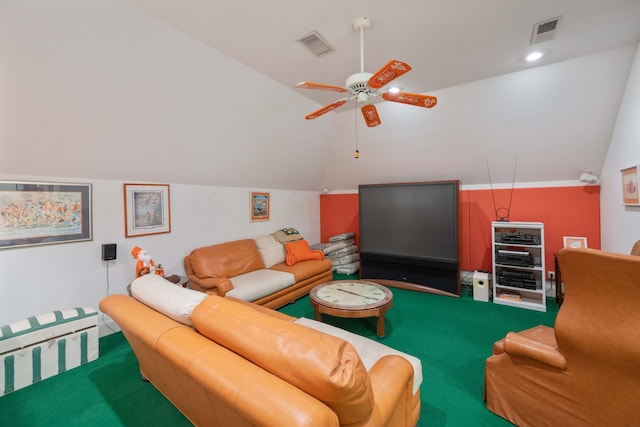 living room featuring ceiling fan, carpet flooring, and vaulted ceiling