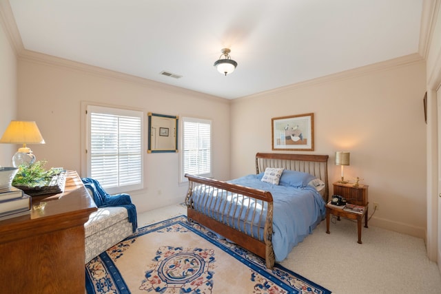 bedroom with crown molding and carpet flooring