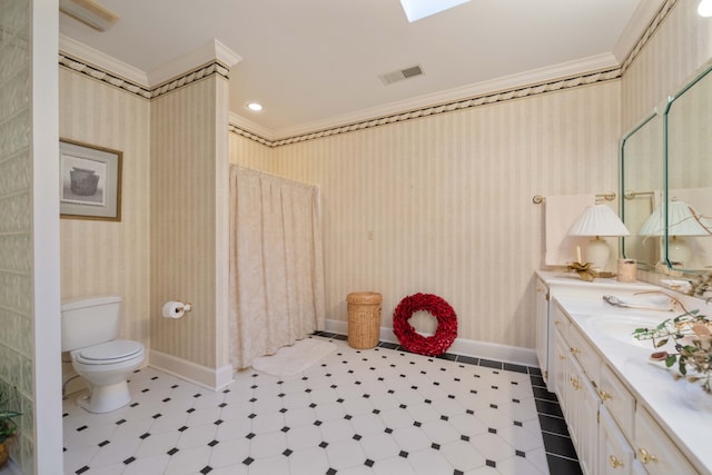 bathroom with vanity, ornamental molding, a shower with curtain, and toilet