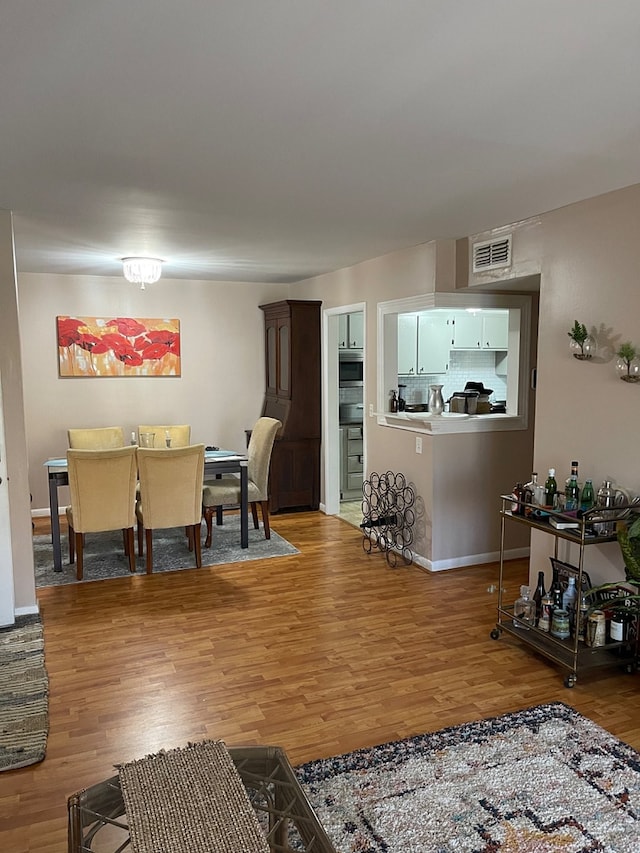 living room with wood-type flooring