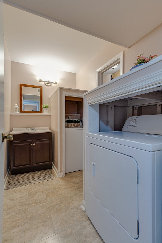 laundry area with washer / clothes dryer