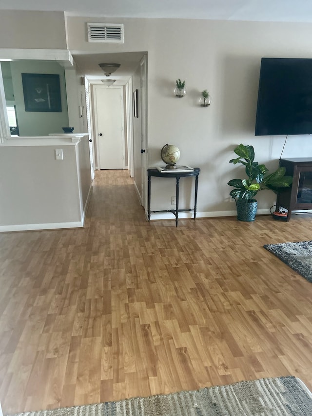 interior space with hardwood / wood-style flooring