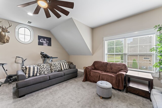 living room featuring light colored carpet and plenty of natural light