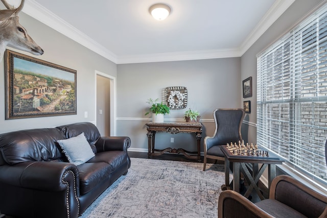 living room featuring crown molding