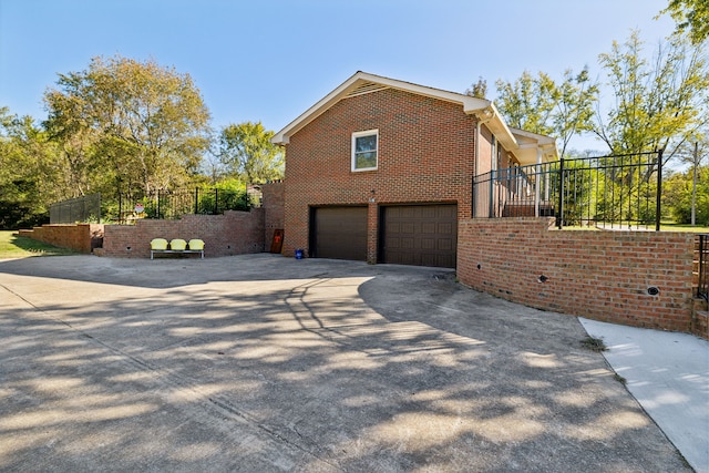 view of home's exterior with a garage