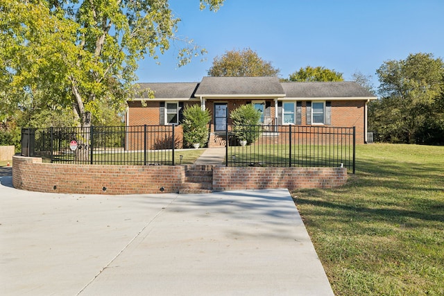 view of front facade with a front yard