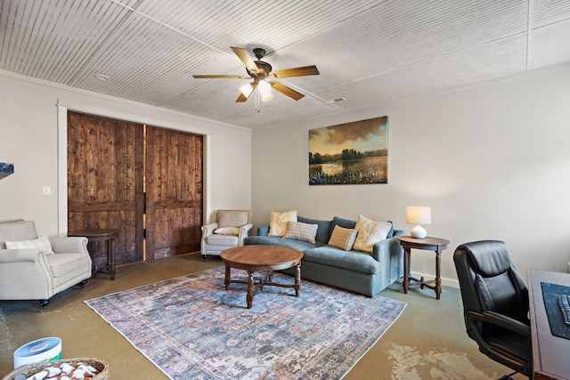 living room with concrete floors and ceiling fan