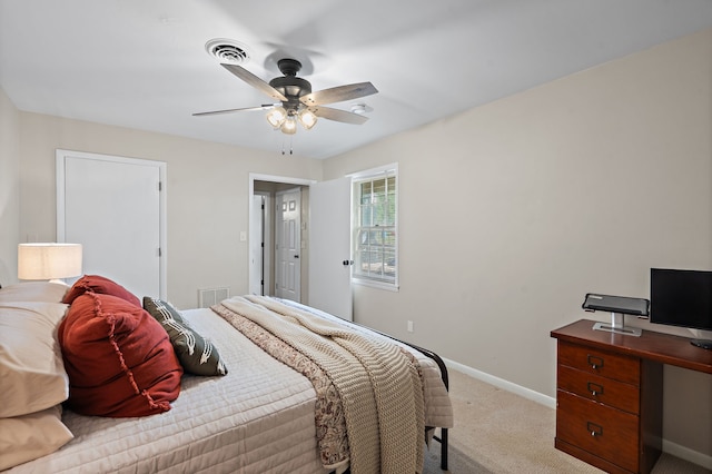 bedroom featuring ceiling fan and light colored carpet