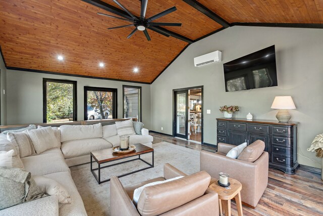 living room with wood ceiling, a wall mounted AC, ceiling fan, light wood-type flooring, and vaulted ceiling with beams