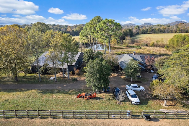 drone / aerial view with a rural view and a water and mountain view