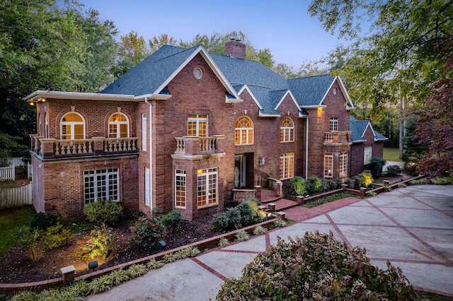 view of front of property with a balcony