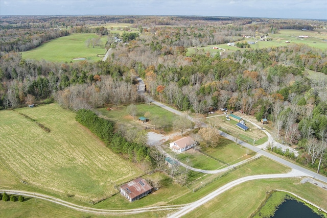 birds eye view of property with a rural view and a water view