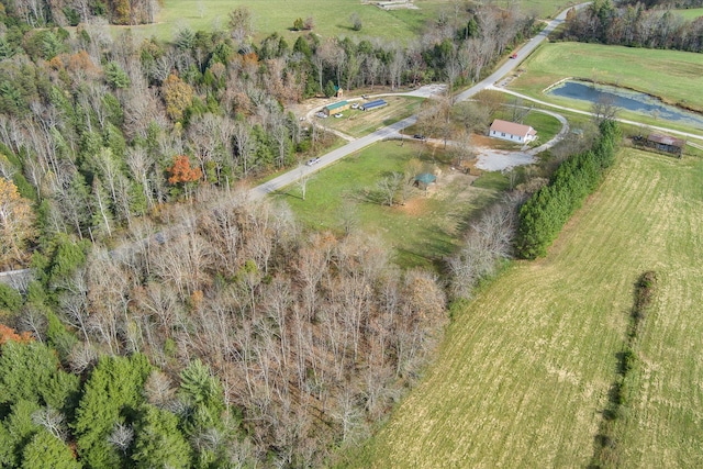 aerial view with a water view and a rural view