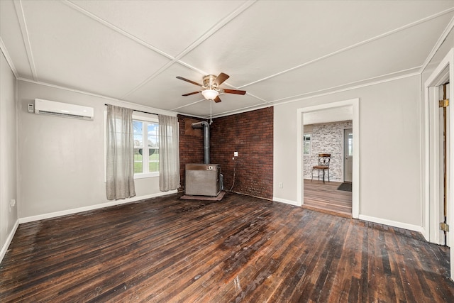 unfurnished living room featuring a wood stove, ceiling fan, a wall unit AC, brick wall, and dark hardwood / wood-style floors