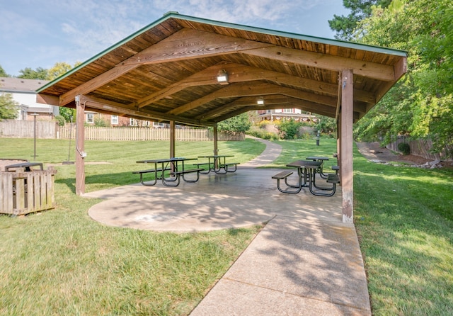 view of home's community featuring a yard, a gazebo, and a patio area