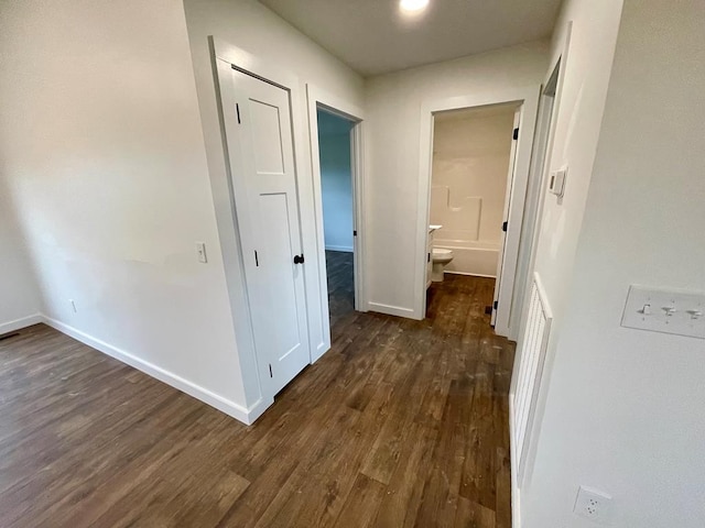 hall featuring dark hardwood / wood-style floors