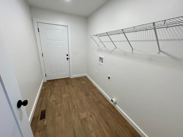 washroom featuring hookup for an electric dryer, wood-type flooring, and hookup for a washing machine