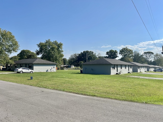 view of home's exterior featuring a yard