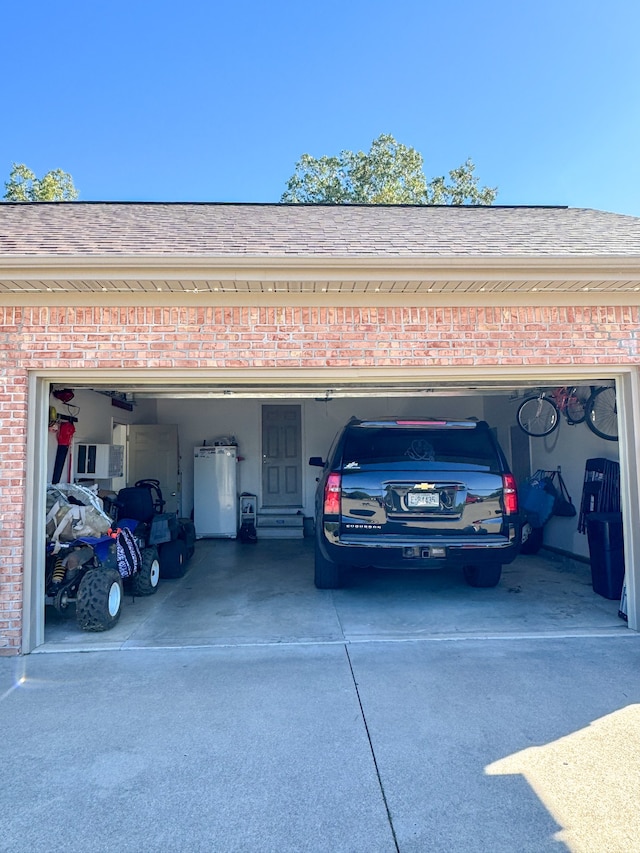 garage featuring fridge