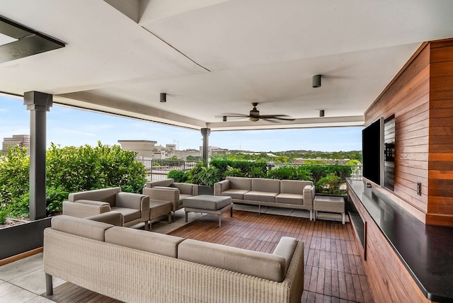 view of patio featuring an outdoor hangout area and ceiling fan