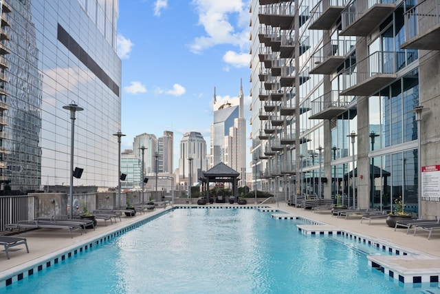 view of swimming pool featuring a gazebo