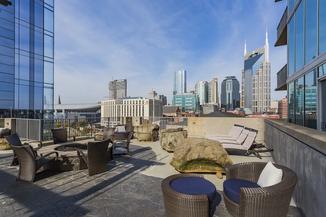 view of patio with an outdoor fire pit