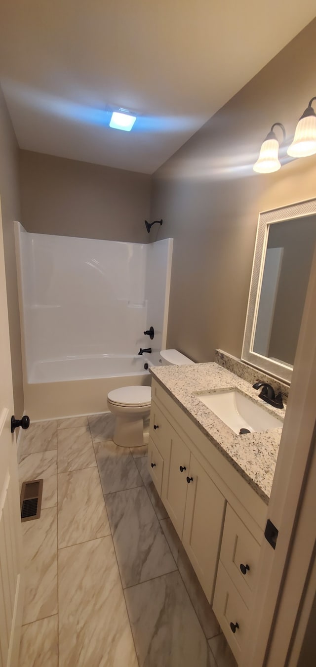 full bathroom featuring vanity, toilet, and shower / washtub combination