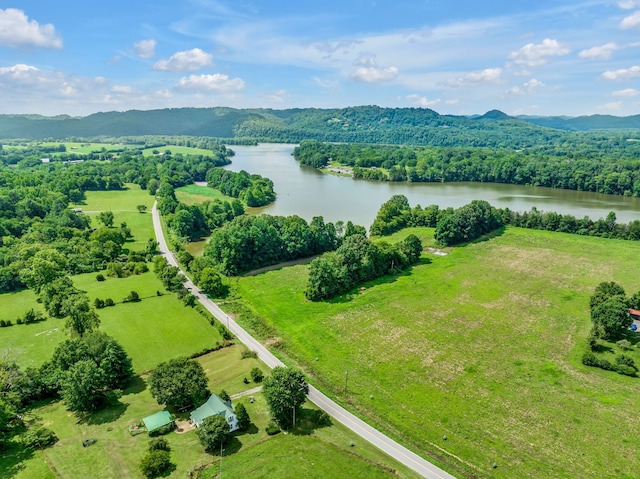 bird's eye view with a water and mountain view