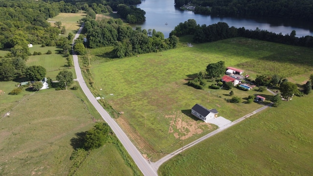 bird's eye view with a rural view and a water view