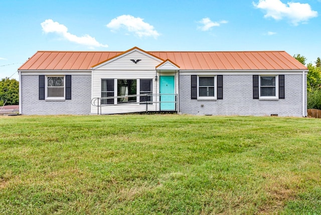 view of front of home with a front lawn