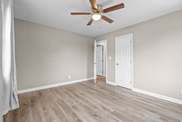 unfurnished bedroom featuring ceiling fan and light hardwood / wood-style flooring