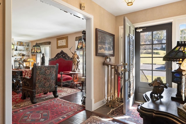 entrance foyer featuring dark hardwood / wood-style floors