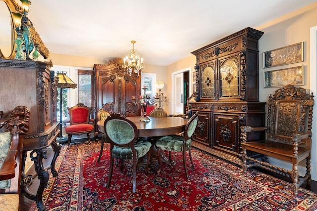 dining area featuring an inviting chandelier