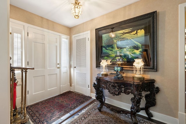 entrance foyer featuring wood-type flooring