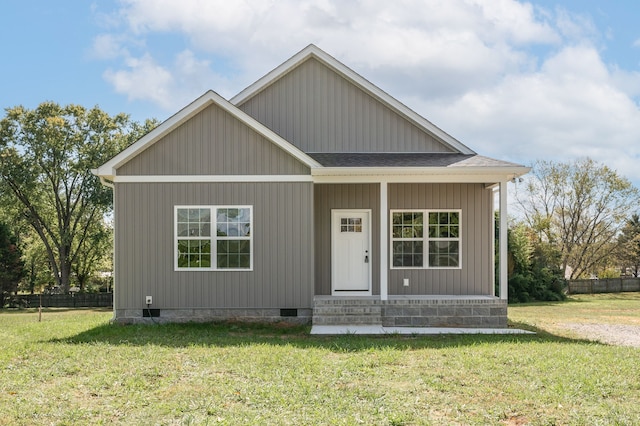 view of front of property with a front lawn