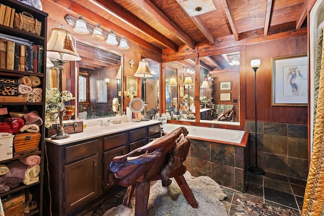 bathroom with vanity, wood ceiling, beam ceiling, and tiled bath