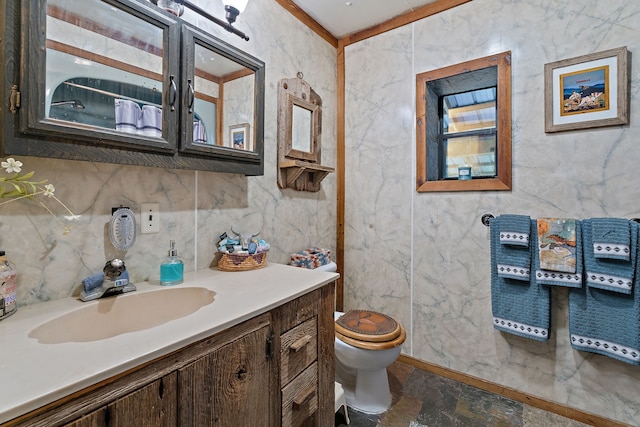 bathroom with vanity and toilet