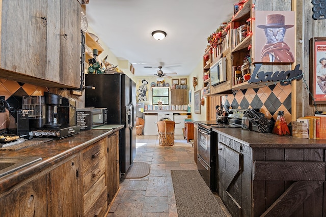 kitchen featuring ceiling fan, black appliances, and decorative backsplash