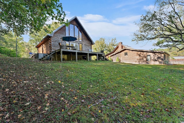 back of house featuring a lawn