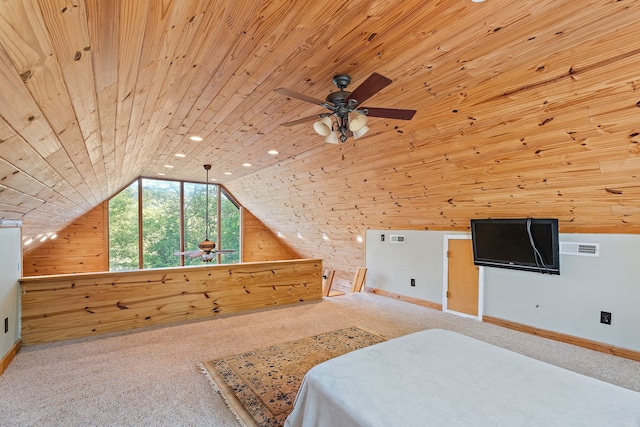 unfurnished bedroom with lofted ceiling, wooden ceiling, carpet, ceiling fan, and wood walls