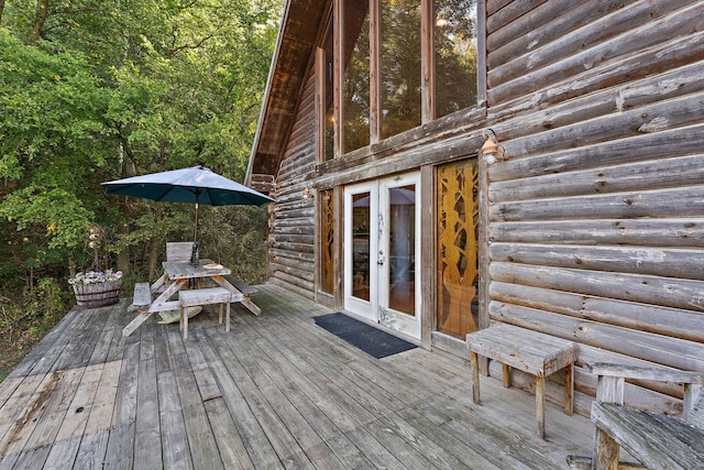 wooden terrace featuring french doors