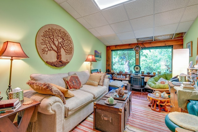 living room with a drop ceiling