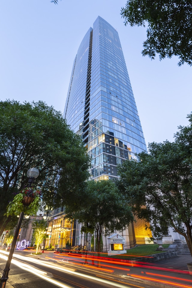 view of outdoor building at dusk