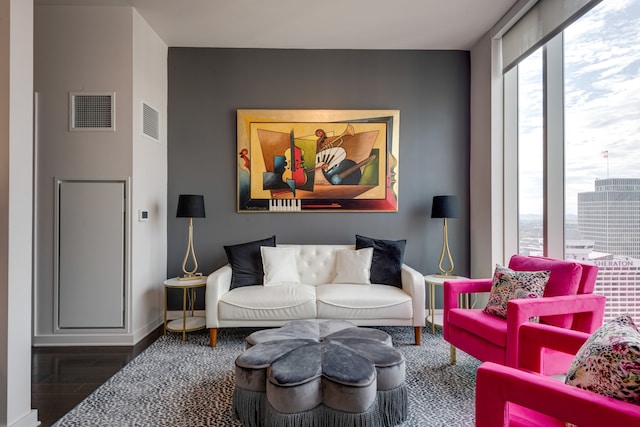 living room with dark hardwood / wood-style floors