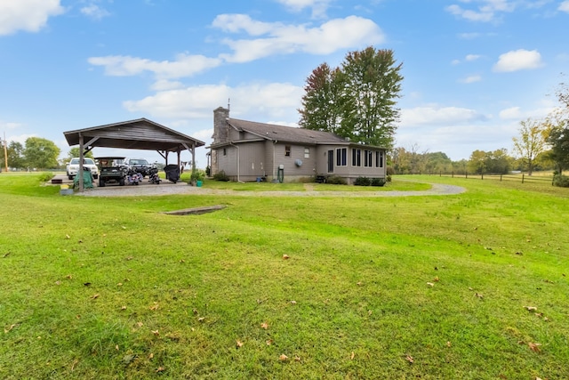 view of yard featuring a carport