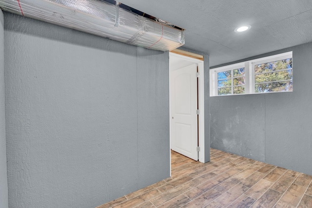 606 S Chestnut St, Monterey, TN 38574 - below grade area with recessed lighting and wood finished floors