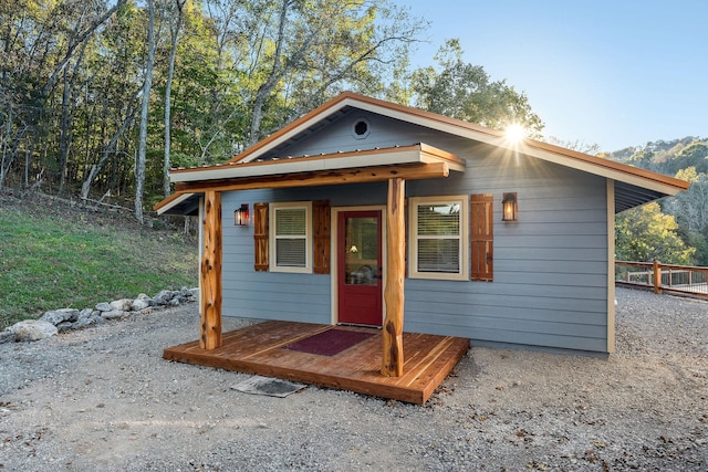 43 Landfill Ln, Brush Creek, TN 38547 - view of front of home featuring an outbuilding and fence