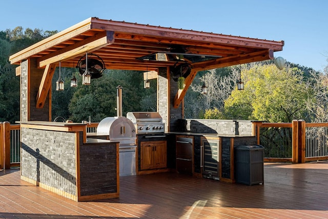 43 Landfill Ln, Brush Creek, TN 38547 - view of patio with a wooden deck, wine cooler, and area for grilling